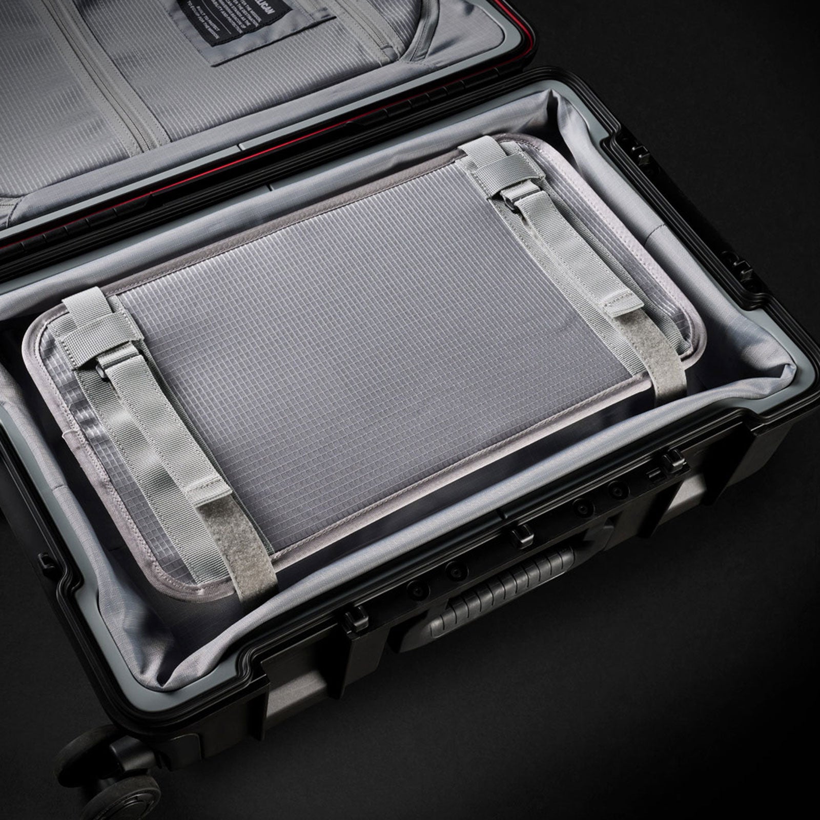 pelican luggage compression straps inside