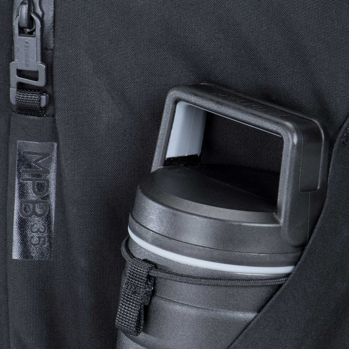 Pelican™ MPB35 Backpack side pocket can hold an 18oz Pelican bottle